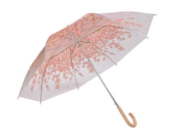 屋外の密集した透明な雨傘のプラスチックによって着色されるホックのハンドル